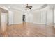 Spacious main bedroom features hardwood flooring, tray ceiling and many doorways at 5470 Beaver Ridge Dr, Cumming, GA 30040