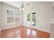 Bright dining area with hardwood floors, French doors to the backyard, and natural light at 5470 Beaver Ridge Dr, Cumming, GA 30040
