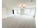 Huge carpeted bedroom with multiple windows and lots of natural light at 5518 Legacy Trl, Douglasville, GA 30135