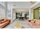 Living room with eat-in kitchen, abundant natural light and open floor plan at 901 Blue Sky Rdg, Snellville, GA 30078