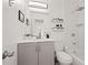 Stylish bathroom featuring vanity storage, a bathtub, and soft lighting at 127 Oldenburg Dr, Riverdale, GA 30274