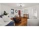 Bright living room with hardwood floors, comfortable seating, and natural light at 127 Oldenburg Dr, Riverdale, GA 30274