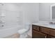 Clean bathroom with a tub and shower combination and a vanity with drawers and cabinets at 209 Groveton Ct, Euharlee, GA 30145