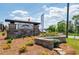 View of the 'Heritage River' community sign surrounded by stone and landscaping at 209 Groveton Ct, Euharlee, GA 30145