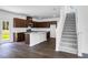 Modern kitchen featuring stainless steel appliances, white subway tile backsplash and an island at 209 Groveton Ct, Euharlee, GA 30145