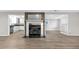Finished basement with a decorative fireplace and an open concept at 2892 Cardinal Lake Dr, Duluth, GA 30096