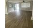 Bright, empty living room features sleek flooring, neutral walls, and ample natural light at 2892 Cardinal Lake Dr, Duluth, GA 30096