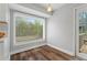 Cozy breakfast nook featuring a large window with natural light and hardwood floors at 700 Bayliss Dr, Marietta, GA 30068