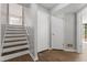 Spacious foyer with hardwood floors, closet, and staircase at 700 Bayliss Dr, Marietta, GA 30068