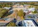 Aerial view shows community amenities with playground, businesses, and landscaped grounds at 73 Rumson Se Ct, Smyrna, GA 30080