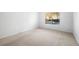 Neutral bedroom with carpeted floors and window, providing ample natural light at 73 Rumson Se Ct, Smyrna, GA 30080