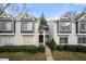 Exterior view of a multi-story townhome with tidy front yard at 73 Rumson Se Ct, Smyrna, GA 30080