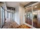 Enclosed patio space with brick flooring and access to the home's interior at 73 Rumson Se Ct, Smyrna, GA 30080