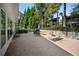 Outdoor patio area featuring brick flooring, lounge seating, and serene surroundings at 73 Rumson Se Ct, Smyrna, GA 30080