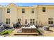 Inviting backyard featuring a cozy patio setup, grill, and neat landscaping at 1119 Brownstone Dr, Marietta, GA 30008