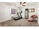 Versatile room featuring a treadmill, modern decor, and natural light, ideal for a home gym or office space at 1119 Brownstone Dr, Marietta, GA 30008