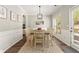 Elegant dining room with a large table and natural light at 1119 Brownstone Dr, Marietta, GA 30008