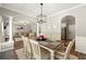 The dining area offers an open floor plan and a stunning view that seamlessly connects to the living room at 1119 Brownstone Dr, Marietta, GA 30008