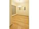 Bright dining room with modern lighting and hardwood floors at 390 17Th Nw St # 2024, Atlanta, GA 30363