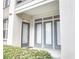 Covered entryway with multiple doors and manicured landscaping at 390 17Th Nw St # 2024, Atlanta, GA 30363