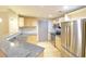 Modern kitchen with stainless steel appliances and granite countertops at 390 17Th Nw St # 2024, Atlanta, GA 30363