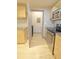 View of kitchen with stainless steel oven and adjacent laundry room at 390 17Th Nw St # 2024, Atlanta, GA 30363