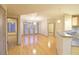 Bright living room features hardwood floors and access to an outdoor balcony at 390 17Th Nw St # 2024, Atlanta, GA 30363