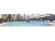 Resort style pool area with seating and umbrellas at 390 17Th Nw St # 2024, Atlanta, GA 30363