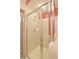 Bathroom featuring a glass enclosed shower with chrome shower head at 390 17Th Nw St # 2024, Atlanta, GA 30363