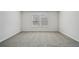 Unfurnished bedroom with neutral walls and plush carpet at 7758 Sheffield Ter, Fairburn, GA 30213