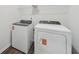 Bright laundry room with a new washer and dryer at 7758 Sheffield Ter, Fairburn, GA 30213
