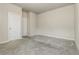 Spacious bedroom featuring plush carpet and neutral paint, ready for personal touches at 1340 Slaton Manor Dr, Conyers, GA 30012