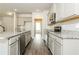 Modern kitchen with granite countertops, stainless steel appliances, and a subway tile backsplash at 1340 Slaton Manor Dr, Conyers, GA 30012