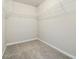 Walk-in closet with carpet floors and wire shelving at 1340 Slaton Manor Dr, Conyers, GA 30012