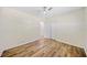 Bedroom with window, new flooring, ceiling fan, and walk-in closet at 1467 Thompson Pl, Decatur, GA 30032