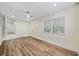 Bright bedroom with a ceiling fan and hardwood flooring at 1467 Thompson Pl, Decatur, GA 30032