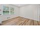 Dining area with large window and new flooring at 1467 Thompson Pl, Decatur, GA 30032
