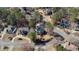 Aerial view showcases the houses nestled among the lush trees at 5679 Brookstone Nw Walk, Acworth, GA 30101