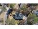 Aerial view of the property highlighting the roof and surrounding landscaping at 5679 Brookstone Nw Walk, Acworth, GA 30101