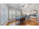 Open dining area featuring hardwood floors, skylight, and seamlessly connected to the kitchen at 5679 Brookstone Nw Walk, Acworth, GA 30101