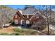 Charming two-story red brick home with black shutters and manicured landscaping at 5679 Brookstone Nw Walk, Acworth, GA 30101