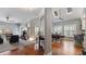 Bright and airy living room and dining area with hardwood floors, skylights, and a cozy fireplace at 5679 Brookstone Nw Walk, Acworth, GA 30101