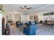 Bright living room with ample seating, fireplace, built-in shelving, and an open floor plan, perfect for entertaining at 5679 Brookstone Nw Walk, Acworth, GA 30101