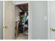 Storage area, as seen through a doorway, revealing shelves and items at 5679 Brookstone Nw Walk, Acworth, GA 30101