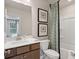 Charming bathroom with framed art, vanity, countertop and a shower/tub combination at 201 Lytham Se Dr, Mableton, GA 30126