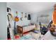 Spare bedroom with a twin bed, instruments, and neutral paint at 291 Folsom Glade Rd, Rydal, GA 30171