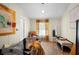 Cozy bedroom with natural light, wood floors, and eclectic decor at 291 Folsom Glade Rd, Rydal, GA 30171