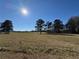 Expansive parcel of land under a clear blue sky, perfect for building or recreational use at 291 Folsom Glade Rd, Rydal, GA 30171