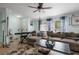 Comfortable living room with soft lighting, sofa, and ceiling fan at 291 Folsom Glade Rd, Rydal, GA 30171