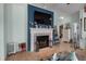 Inviting living room with a fireplace, ideal for cozy evenings and relaxation. Perfect for Gathering gatherings at 291 Folsom Glade Rd, Rydal, GA 30171